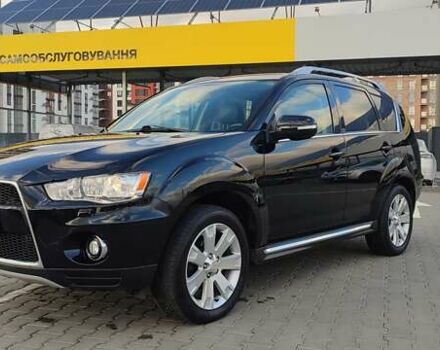 Черный Мицубиси Аутлендер, объемом двигателя 2 л и пробегом 210 тыс. км за 10600 $, фото 2 на Automoto.ua