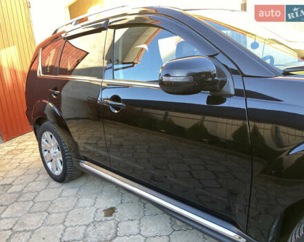 Черный Мицубиси Аутлендер, объемом двигателя 1.97 л и пробегом 292 тыс. км за 10900 $, фото 6 на Automoto.ua