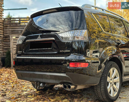 Черный Мицубиси Аутлендер, объемом двигателя 2.2 л и пробегом 226 тыс. км за 11500 $, фото 39 на Automoto.ua