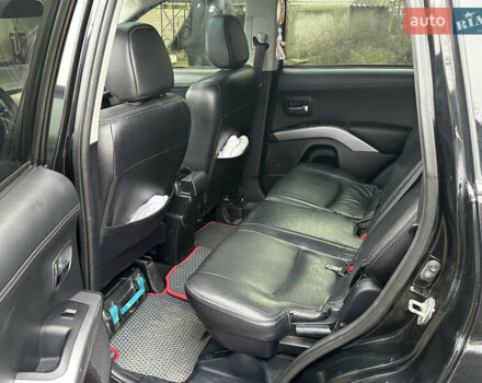 Чорний Міцубісі Аутлендер, об'ємом двигуна 2.36 л та пробігом 197 тис. км за 11300 $, фото 14 на Automoto.ua