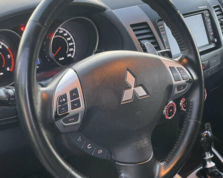 Черный Мицубиси Аутлендер, объемом двигателя 0 л и пробегом 257 тыс. км за 10399 $, фото 24 на Automoto.ua