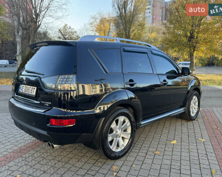 Черный Мицубиси Аутлендер, объемом двигателя 3 л и пробегом 162 тыс. км за 10800 $, фото 5 на Automoto.ua