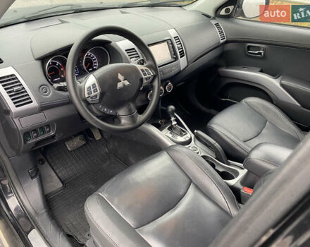 Черный Мицубиси Аутлендер, объемом двигателя 2.2 л и пробегом 227 тыс. км за 10700 $, фото 23 на Automoto.ua