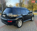 Черный Мицубиси Аутлендер, объемом двигателя 3 л и пробегом 162 тыс. км за 10800 $, фото 5 на Automoto.ua
