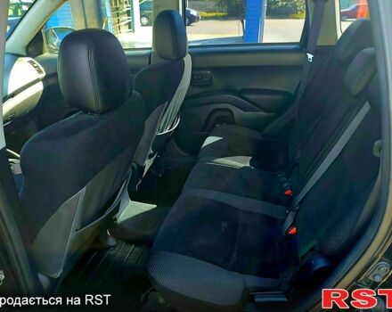 Чорний Міцубісі Аутлендер, об'ємом двигуна 2 л та пробігом 291 тис. км за 11200 $, фото 5 на Automoto.ua