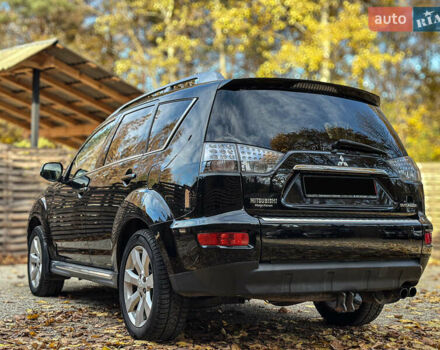 Черный Мицубиси Аутлендер, объемом двигателя 2.2 л и пробегом 226 тыс. км за 11500 $, фото 15 на Automoto.ua