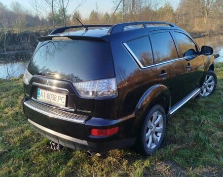 Черный Мицубиси Аутлендер, объемом двигателя 2 л и пробегом 261 тыс. км за 9700 $, фото 13 на Automoto.ua