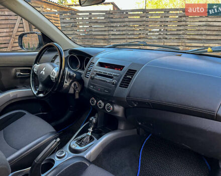 Черный Мицубиси Аутлендер, объемом двигателя 2.2 л и пробегом 226 тыс. км за 11500 $, фото 98 на Automoto.ua