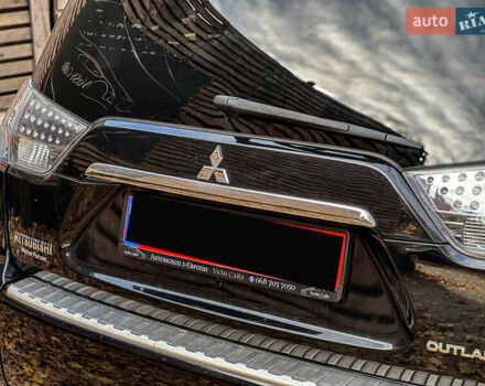 Черный Мицубиси Аутлендер, объемом двигателя 2.2 л и пробегом 226 тыс. км за 11500 $, фото 51 на Automoto.ua