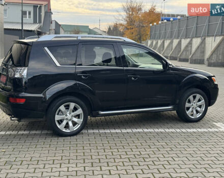 Черный Мицубиси Аутлендер, объемом двигателя 2.2 л и пробегом 225 тыс. км за 10950 $, фото 14 на Automoto.ua
