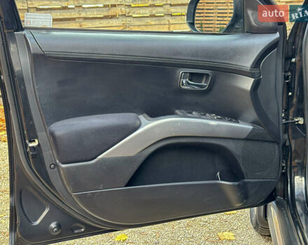 Черный Мицубиси Аутлендер, объемом двигателя 2.2 л и пробегом 226 тыс. км за 11500 $, фото 60 на Automoto.ua