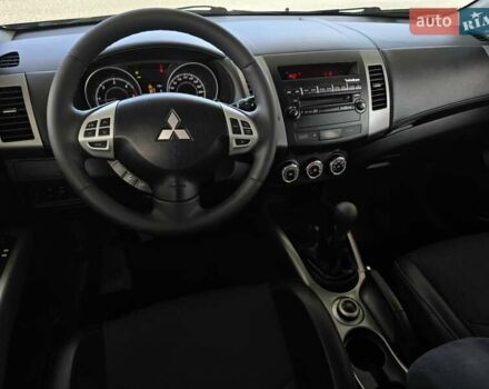 Мицубиси Аутлендер 2010 в Калуше на Automoto.ua Черный Мицубиси Аутлендер, объемом двигателя 1.97 л и пробегом 270 тыс. км за 11700 $, фото 29 на Automoto.ua