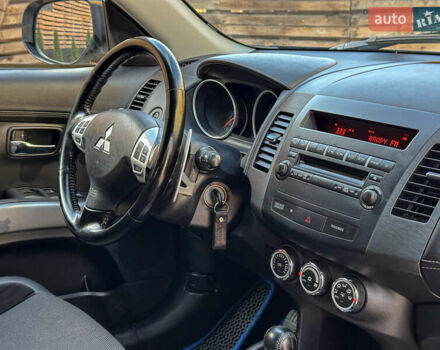 Черный Мицубиси Аутлендер, объемом двигателя 2.2 л и пробегом 226 тыс. км за 11500 $, фото 99 на Automoto.ua