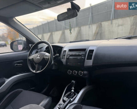 Черный Мицубиси Аутлендер, объемом двигателя 2.2 л и пробегом 225 тыс. км за 10950 $, фото 33 на Automoto.ua