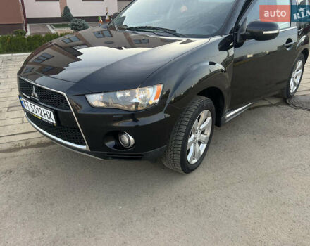 Черный Мицубиси Аутлендер, объемом двигателя 2.36 л и пробегом 244 тыс. км за 9850 $, фото 2 на Automoto.ua