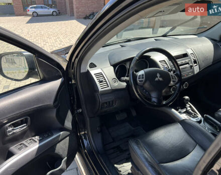 Чорний Міцубісі Аутлендер, об'ємом двигуна 2.2 л та пробігом 214 тис. км за 10600 $, фото 13 на Automoto.ua