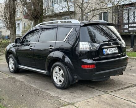 Черный Мицубиси Аутлендер, объемом двигателя 2.4 л и пробегом 197 тыс. км за 11300 $, фото 3 на Automoto.ua