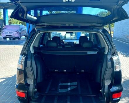 Чорний Міцубісі Аутлендер, об'ємом двигуна 2 л та пробігом 291 тис. км за 11200 $, фото 4 на Automoto.ua