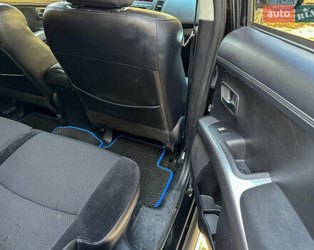 Черный Мицубиси Аутлендер, объемом двигателя 2.2 л и пробегом 226 тыс. км за 11500 $, фото 92 на Automoto.ua