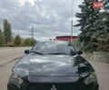 Черный Мицубиси Аутлендер, объемом двигателя 2 л и пробегом 225 тыс. км за 9800 $, фото 4 на Automoto.ua