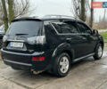 Чорний Міцубісі Аутлендер, об'ємом двигуна 2.36 л та пробігом 197 тис. км за 11300 $, фото 9 на Automoto.ua