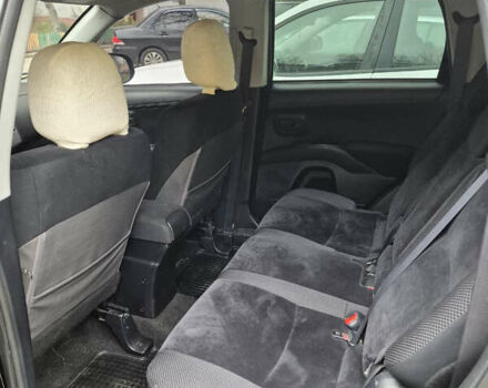 Черный Мицубиси Аутлендер, объемом двигателя 2.4 л и пробегом 198 тыс. км за 10500 $, фото 8 на Automoto.ua