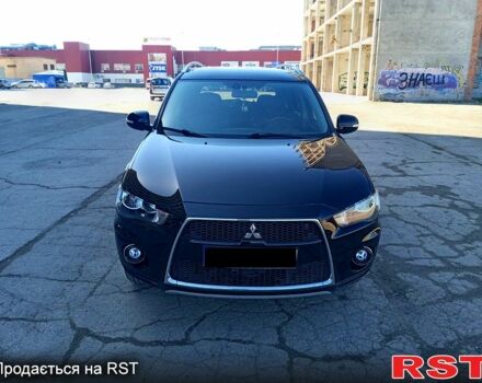 Черный Мицубиси Аутлендер, объемом двигателя 2 л и пробегом 224 тыс. км за 12300 $, фото 1 на Automoto.ua