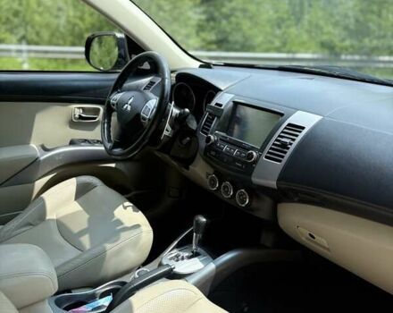 Черный Мицубиси Аутлендер, объемом двигателя 2.4 л и пробегом 275 тыс. км за 12000 $, фото 13 на Automoto.ua