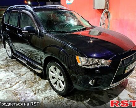 Черный Мицубиси Аутлендер, объемом двигателя 2.4 л и пробегом 70 тыс. км за 10500 $, фото 2 на Automoto.ua
