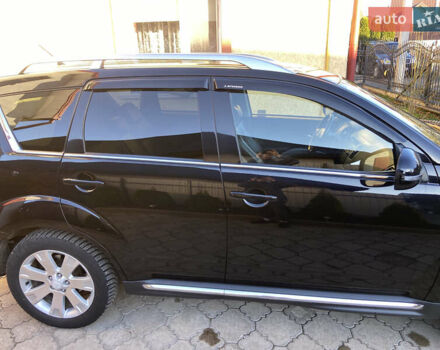 Черный Мицубиси Аутлендер, объемом двигателя 1.97 л и пробегом 292 тыс. км за 10900 $, фото 5 на Automoto.ua