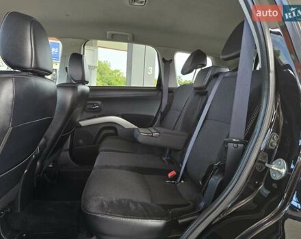 Мицубиси Аутлендер 2010 в Калуше на Automoto.ua Черный Мицубиси Аутлендер, объемом двигателя 1.97 л и пробегом 270 тыс. км за 11700 $, фото 39 на Automoto.ua