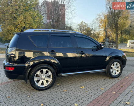 Черный Мицубиси Аутлендер, объемом двигателя 3 л и пробегом 162 тыс. км за 10800 $, фото 4 на Automoto.ua