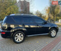 Черный Мицубиси Аутлендер, объемом двигателя 3 л и пробегом 162 тыс. км за 10800 $, фото 4 на Automoto.ua