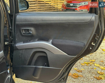 Черный Мицубиси Аутлендер, объемом двигателя 2.2 л и пробегом 226 тыс. км за 11500 $, фото 93 на Automoto.ua