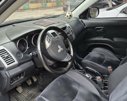 Черный Мицубиси Аутлендер, объемом двигателя 2.4 л и пробегом 198 тыс. км за 10500 $, фото 7 на Automoto.ua