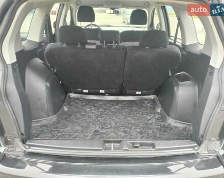 Чорний Міцубісі Аутлендер, об'ємом двигуна 2 л та пробігом 226 тис. км за 10750 $, фото 5 на Automoto.ua