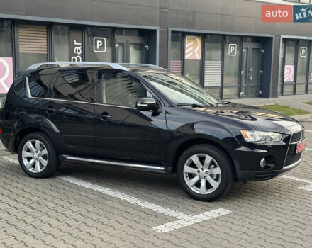 Черный Мицубиси Аутлендер, объемом двигателя 2.2 л и пробегом 225 тыс. км за 10950 $, фото 12 на Automoto.ua