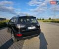 Черный Мицубиси Аутлендер, объемом двигателя 2 л и пробегом 182 тыс. км за 9600 $, фото 4 на Automoto.ua