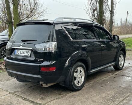 Черный Мицубиси Аутлендер, объемом двигателя 2.4 л и пробегом 197 тыс. км за 11300 $, фото 2 на Automoto.ua