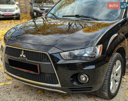 Черный Мицубиси Аутлендер, объемом двигателя 2.2 л и пробегом 226 тыс. км за 11500 $, фото 31 на Automoto.ua