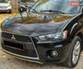 Черный Мицубиси Аутлендер, объемом двигателя 2.2 л и пробегом 226 тыс. км за 11500 $, фото 31 на Automoto.ua