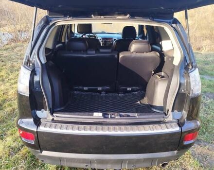 Черный Мицубиси Аутлендер, объемом двигателя 2 л и пробегом 261 тыс. км за 9700 $, фото 10 на Automoto.ua