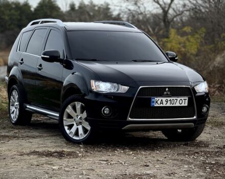 Черный Мицубиси Аутлендер, объемом двигателя 2 л и пробегом 300 тыс. км за 5500 $, фото 2 на Automoto.ua