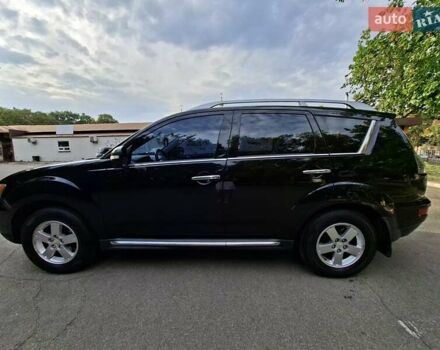 Мицубиси Аутлендер 2010 в Чернигове на Automoto.ua Черный Мицубиси Аутлендер, объемом двигателя 2.4 л и пробегом 180 тыс. км за 11500 $, фото 9 на Automoto.ua