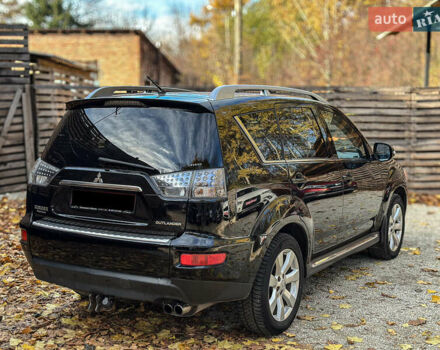 Черный Мицубиси Аутлендер, объемом двигателя 2.2 л и пробегом 226 тыс. км за 11500 $, фото 3 на Automoto.ua
