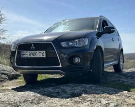 Чорний Міцубісі Аутлендер, об'ємом двигуна 2.4 л та пробігом 187 тис. км за 10200 $, фото 1 на Automoto.ua