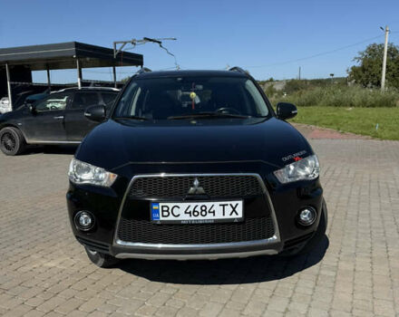 Чорний Міцубісі Аутлендер, об'ємом двигуна 2.36 л та пробігом 235 тис. км за 12500 $, фото 1 на Automoto.ua