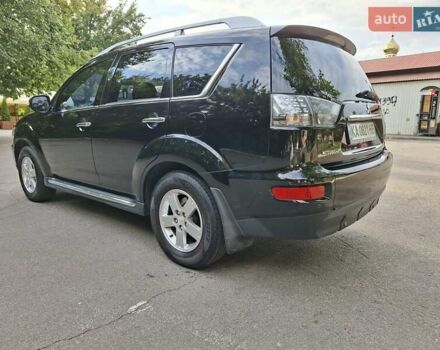 Мицубиси Аутлендер 2010 в Чернигове на Automoto.ua Черный Мицубиси Аутлендер, объемом двигателя 2.4 л и пробегом 180 тыс. км за 11500 $, фото 8 на Automoto.ua