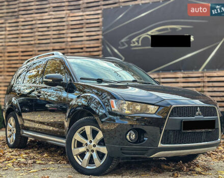 Черный Мицубиси Аутлендер, объемом двигателя 2.2 л и пробегом 226 тыс. км за 11500 $, фото 6 на Automoto.ua
