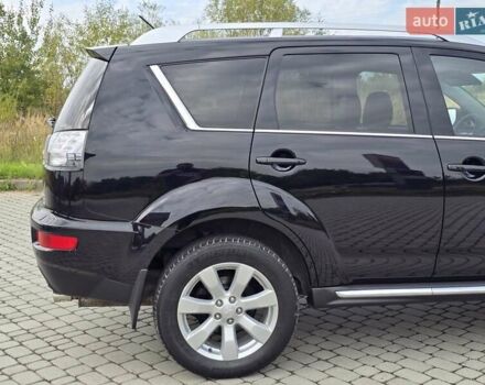 Мицубиси Аутлендер 2010 в Калуше на Automoto.ua Черный Мицубиси Аутлендер, объемом двигателя 1.97 л и пробегом 270 тыс. км за 11700 $, фото 15 на Automoto.ua